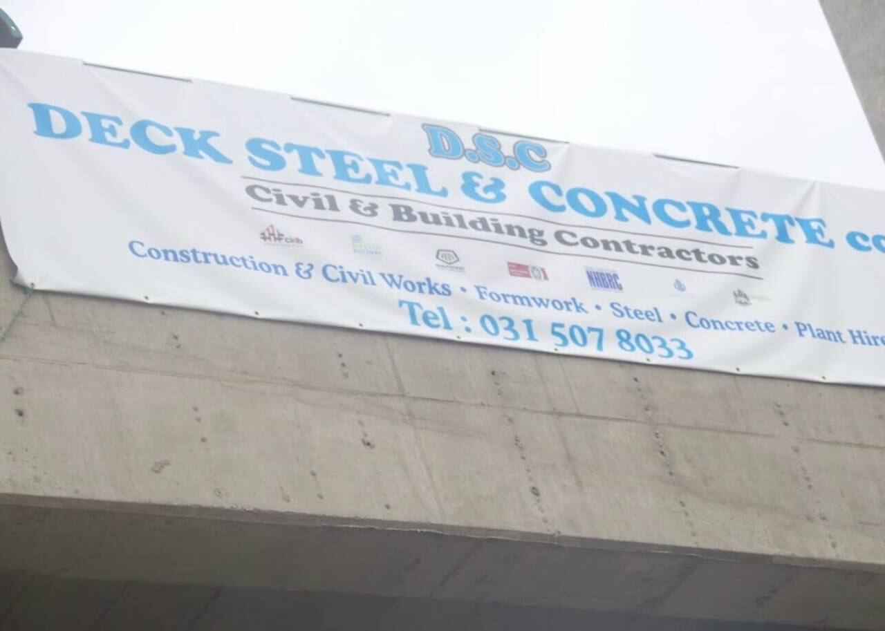 Deck, Steel & Concrete signage reading Civil & Building Contractors, Construction & Civil Works, Formwork, Steel, Concrete, Plant Hire