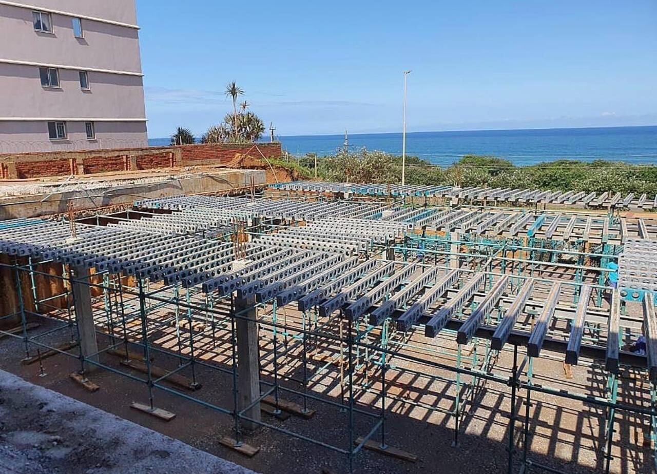 Formwork beam system on a coastal slab