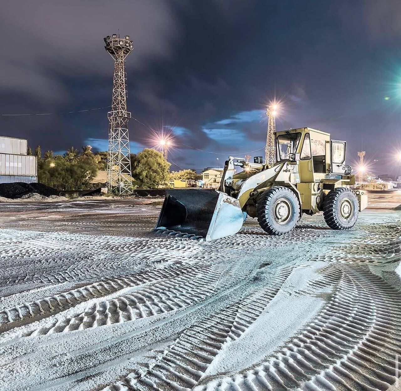 Front-end loader working at night